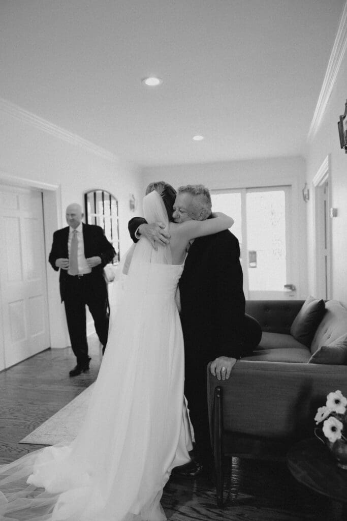 grandparents hugging bride at twin fields estate