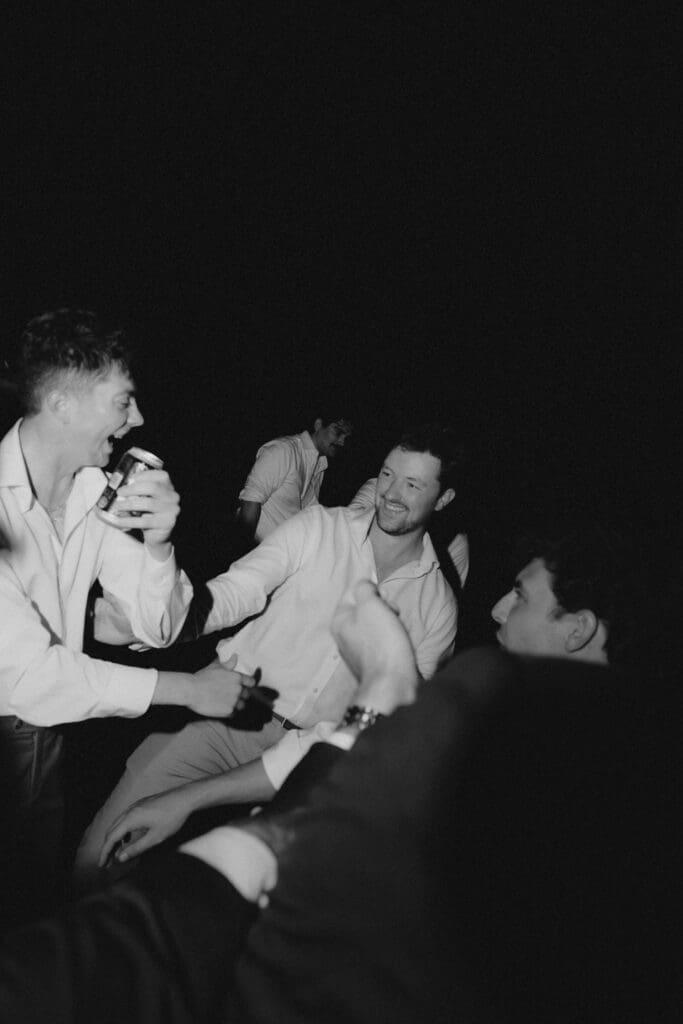 groomsmen dancing at twin fields estate venue
