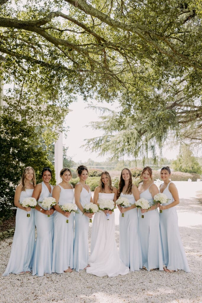 twin fields estate wedding, bridesmaid portraits, in blue dresses with hydrangeas