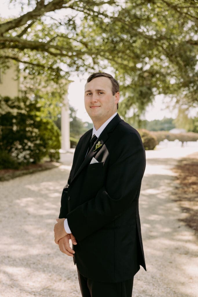 groom portraits at twin fields estate venue